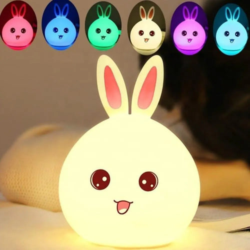 Cute rabbit-shaped night light with colorful options in the background